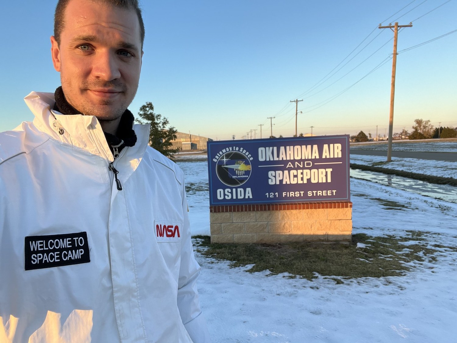 At the spaceport sign for the first time